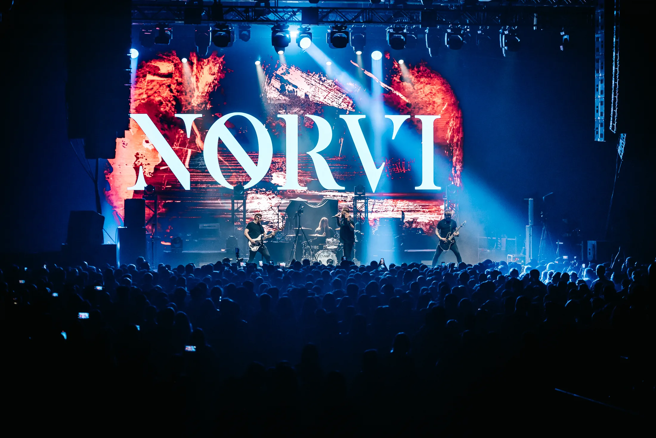 NORVI performing on stage at the Skillet show in Almaty