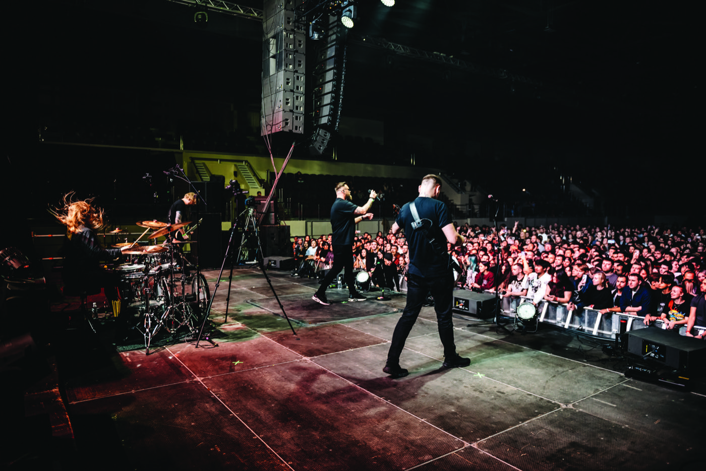 NORVI performing on stage in front of a crowd